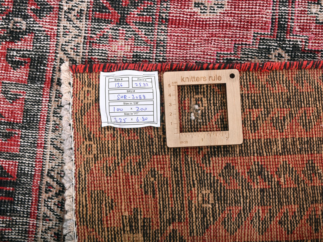 a piece of wood sitting on top of a rug
