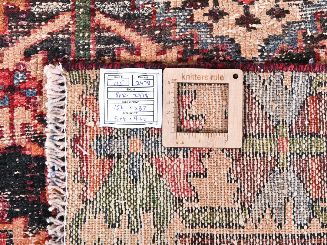 a close up of a rug with a ruler on it