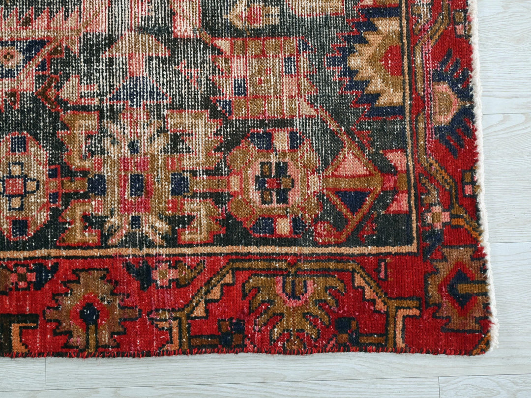 a red rug with a picture of a man on it