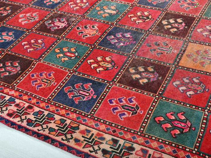 a multicolored rug with a pattern on it