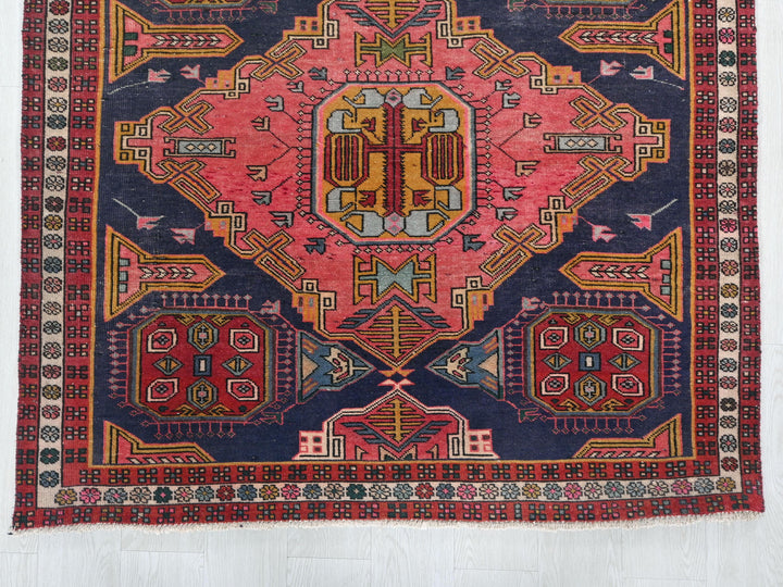 a colorful rug with a design on it
