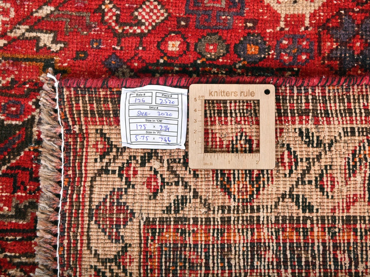 a close up of a rug with a tag on it