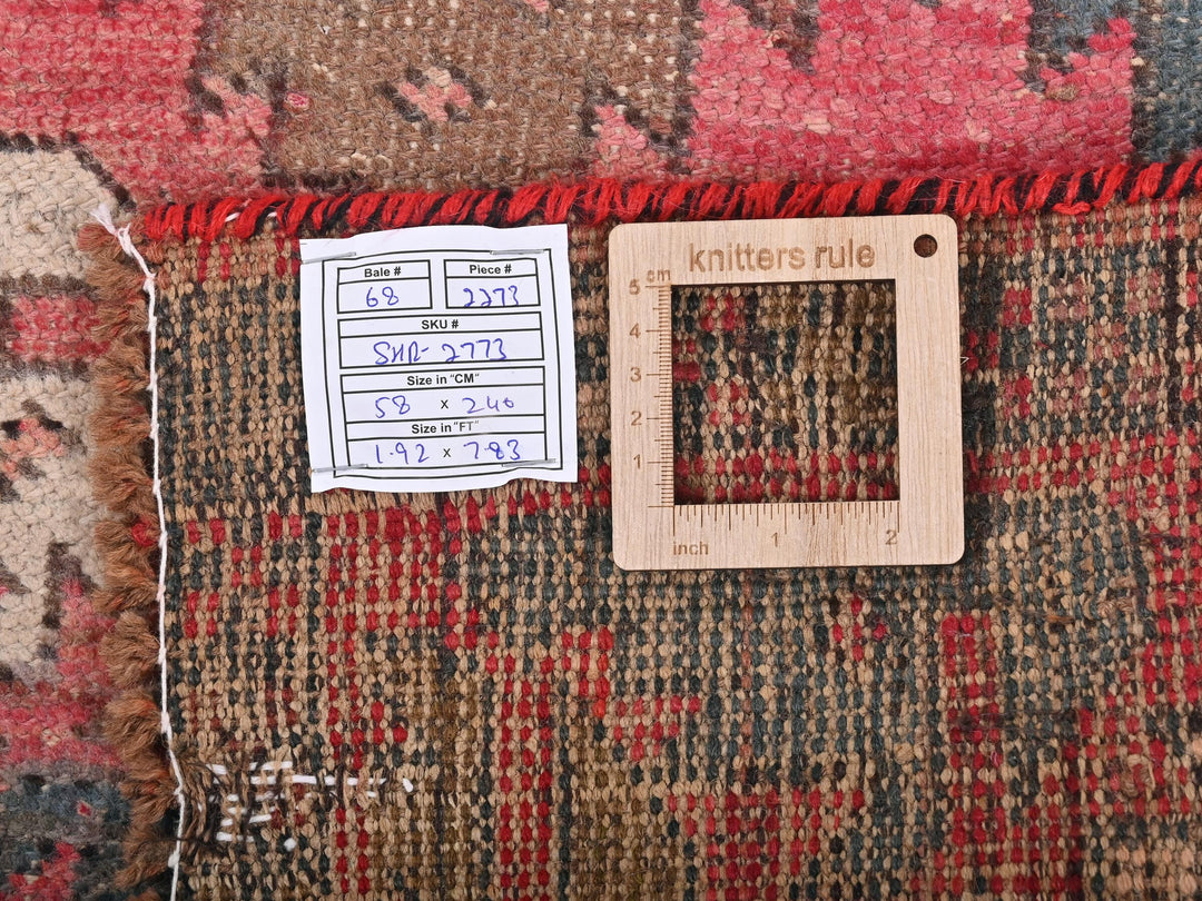 a piece of wood sitting on top of a rug