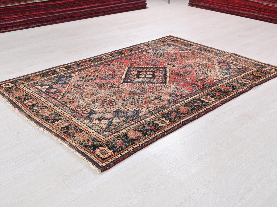 a rug is laying on the floor in a room