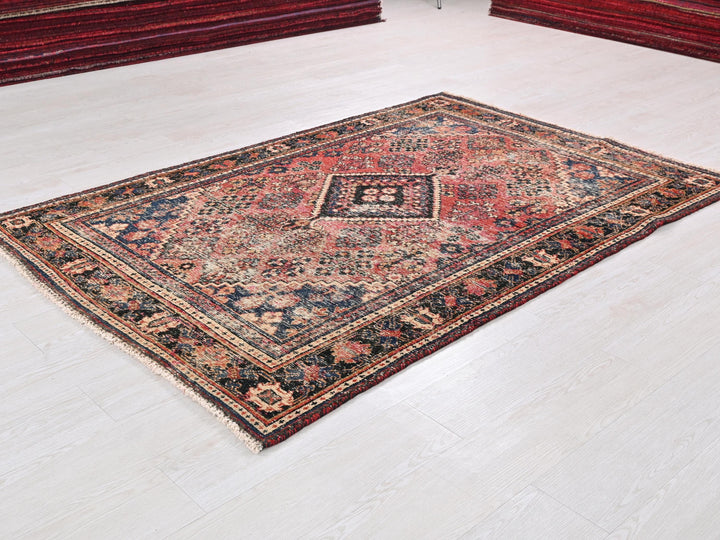 a rug is laying on the floor in a room
