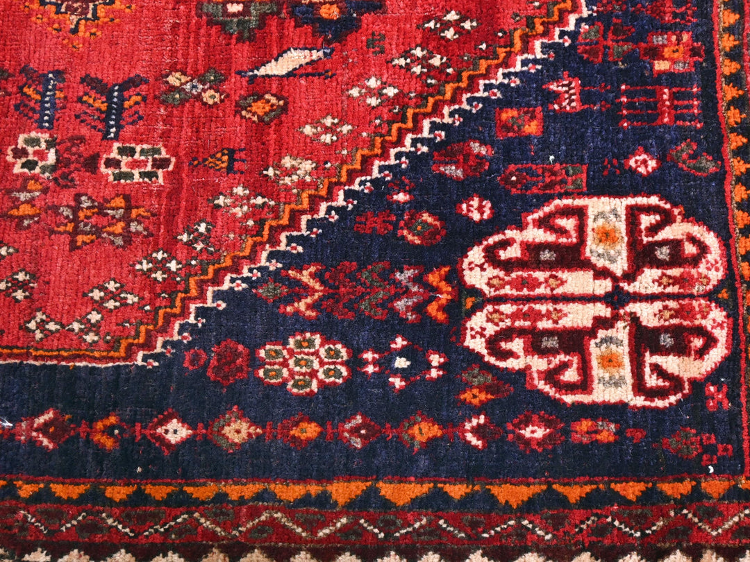 a close up of a colorful oriental rug
