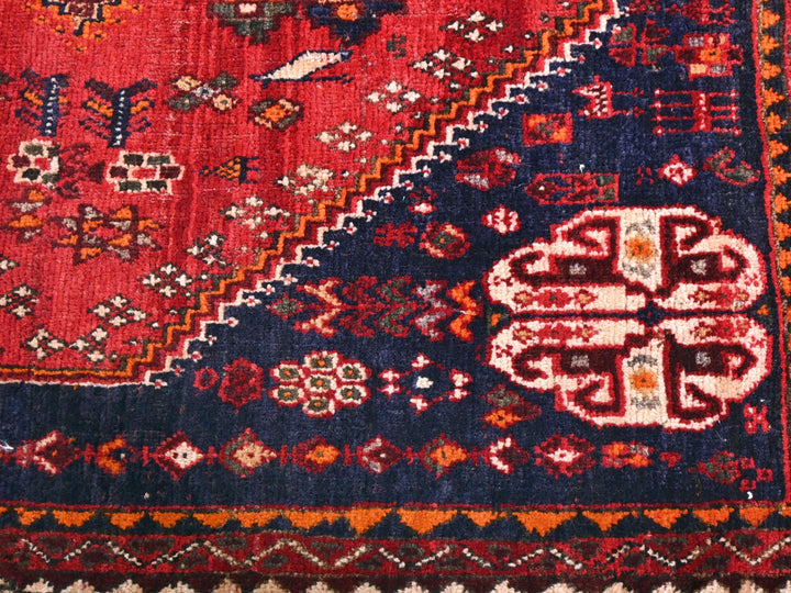 a close up of a colorful oriental rug