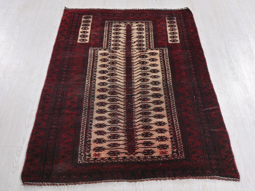 a red rug on the floor with a white floor