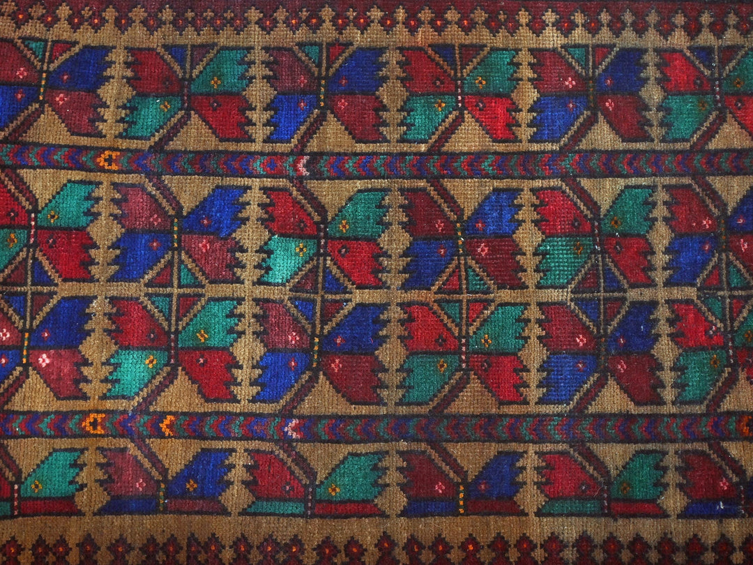a multicolored rug with hearts on it