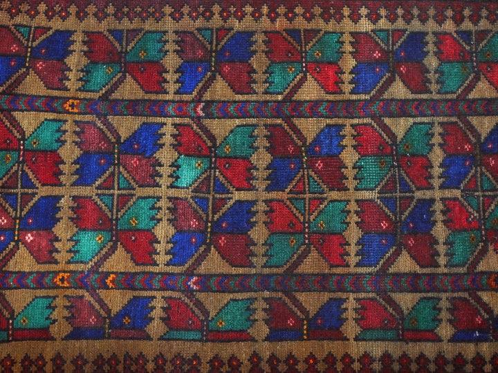a multicolored rug with hearts on it