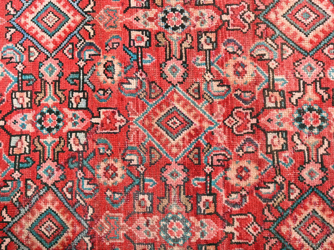 a close up of a red and blue rug