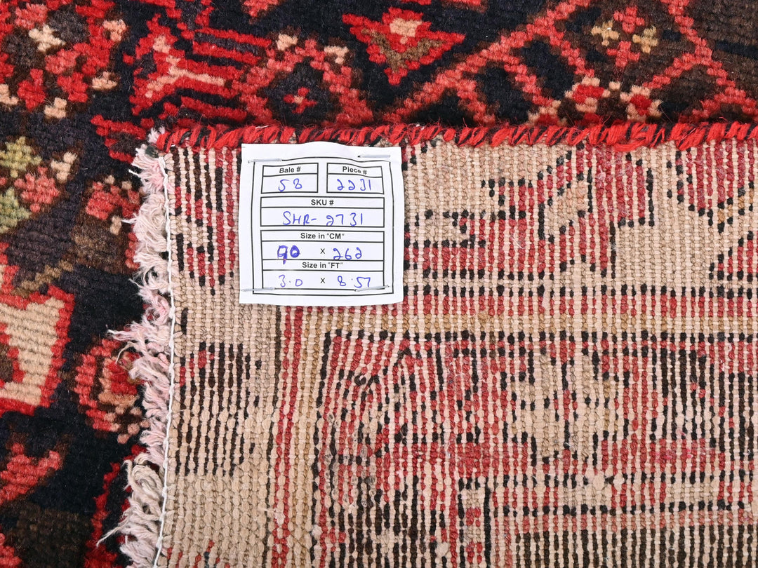 a close up of a rug with a tag on it
