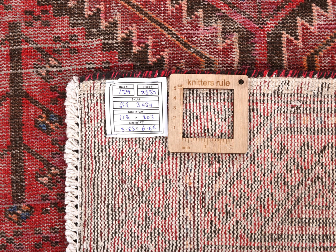 a pile of rugs with a price tag on them
