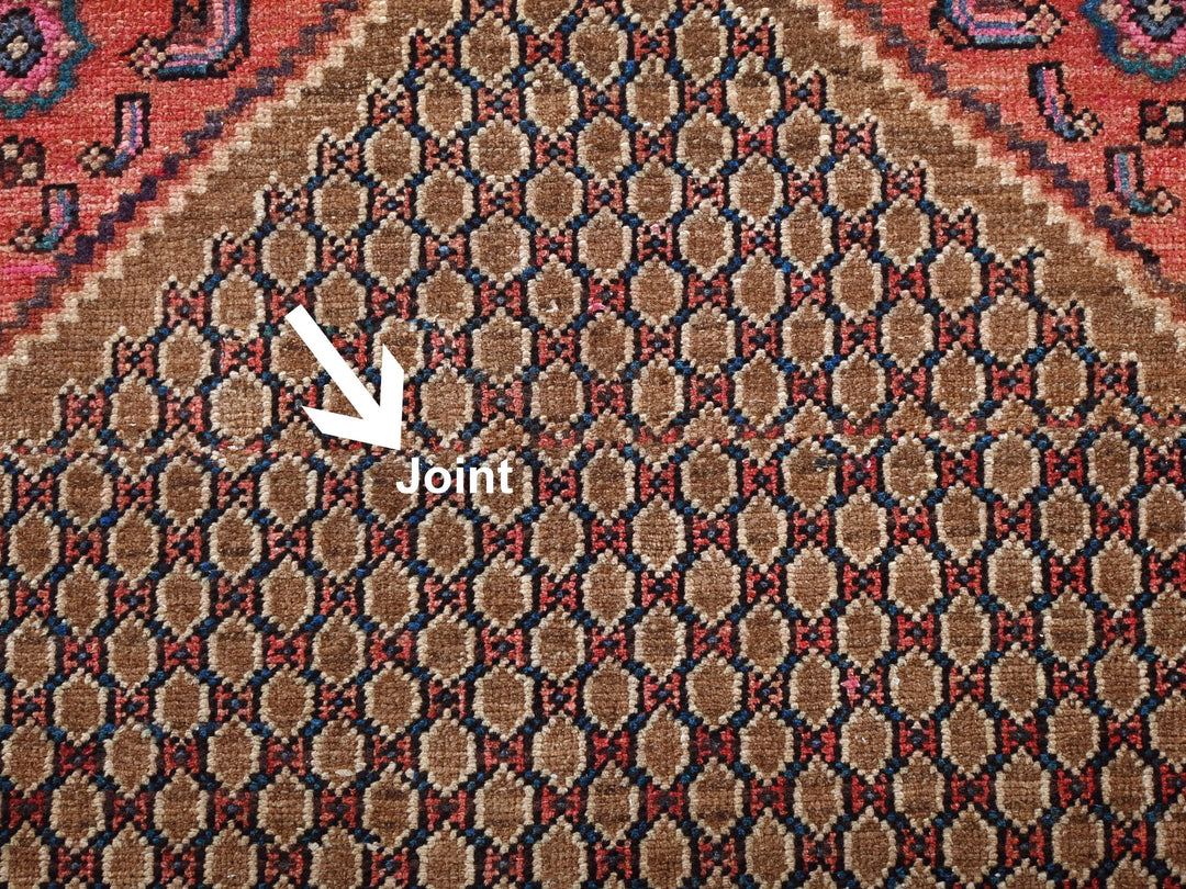 a close up of a rug with a white arrow pointing to it
