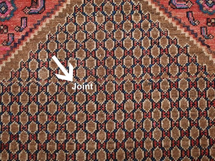 a close up of a rug with a white arrow pointing to it