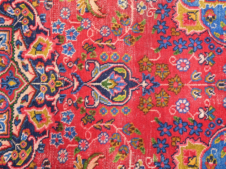 a close up of an oriental rug with many colors
