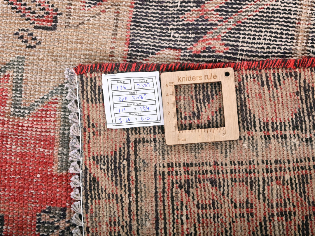 a piece of wood sitting on top of a rug