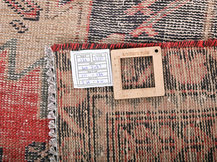 a piece of wood sitting on top of a rug