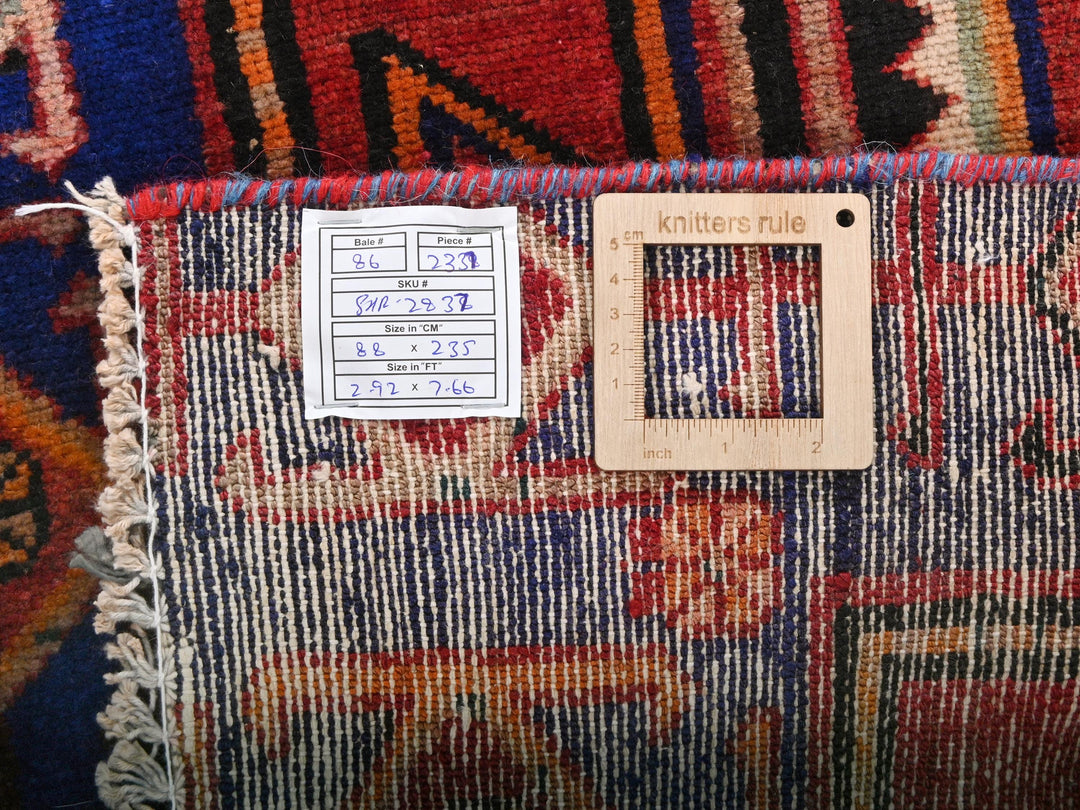 a close up of a rug with a tag on it