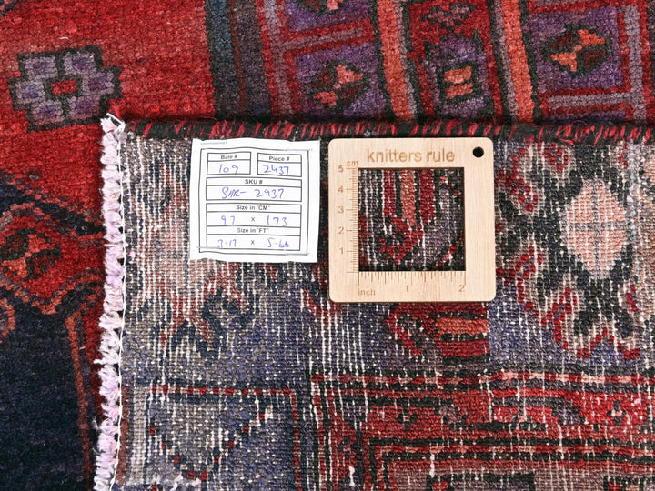 a close up of a rug with a tag on it