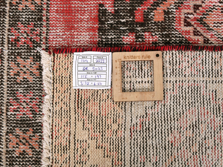 a piece of wood sitting on top of a rug