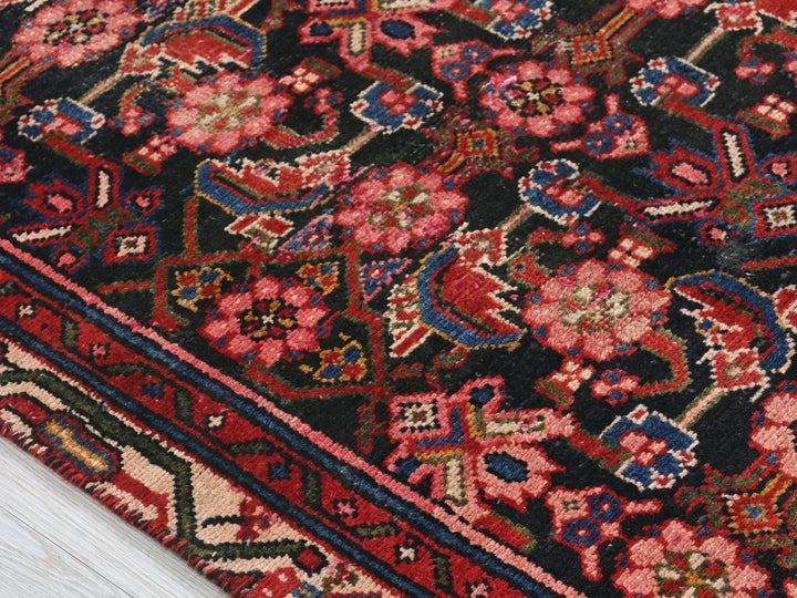 a close up of a rug on a wooden floor