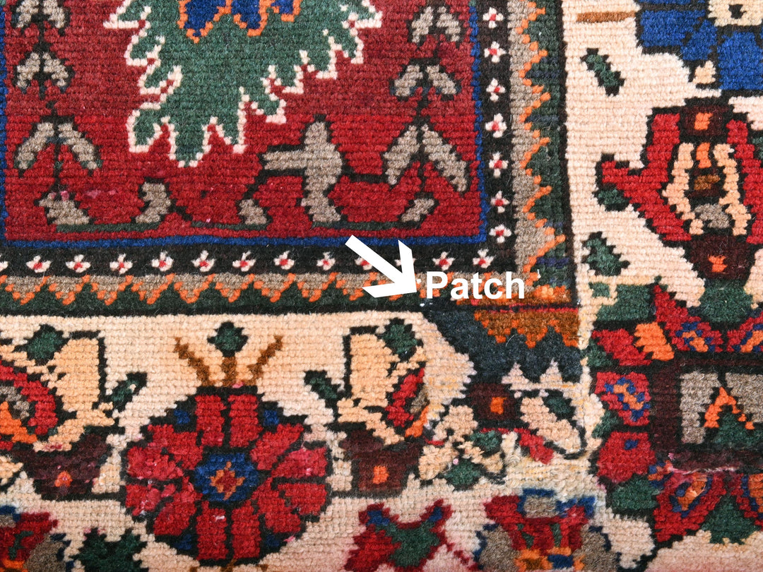 a close up of a rug with a patch in the middle