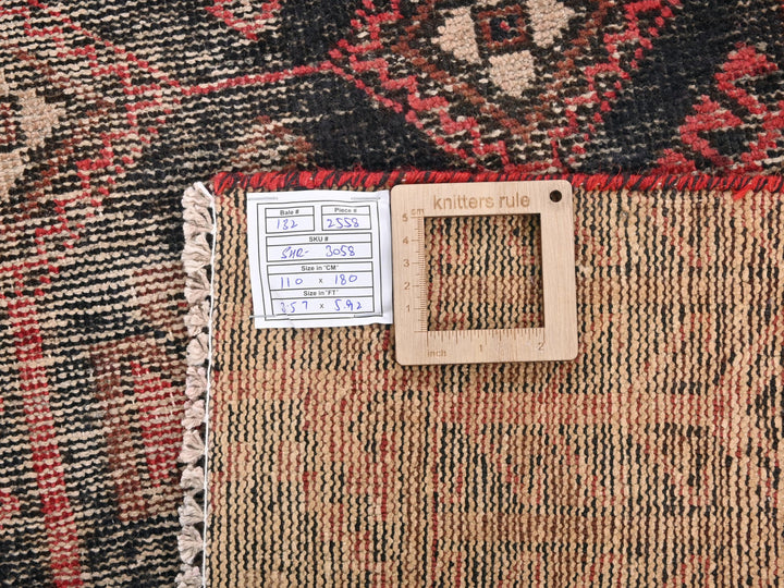 a close up of a rug with a tag on it