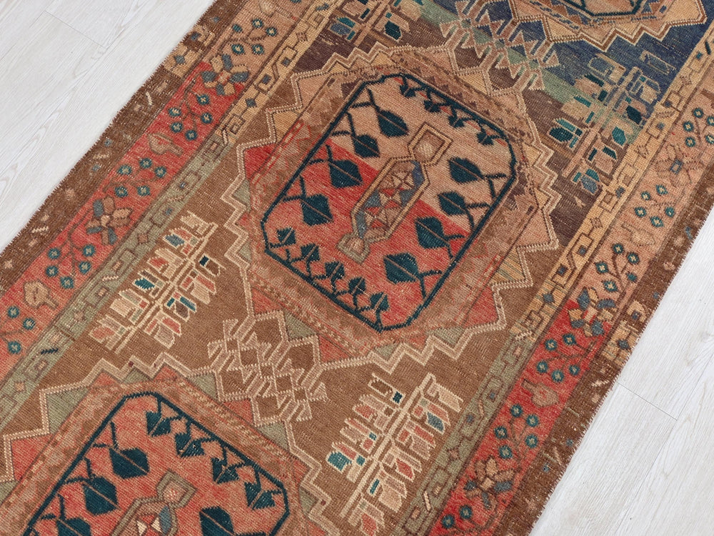 a rug on a wooden floor with a white floor