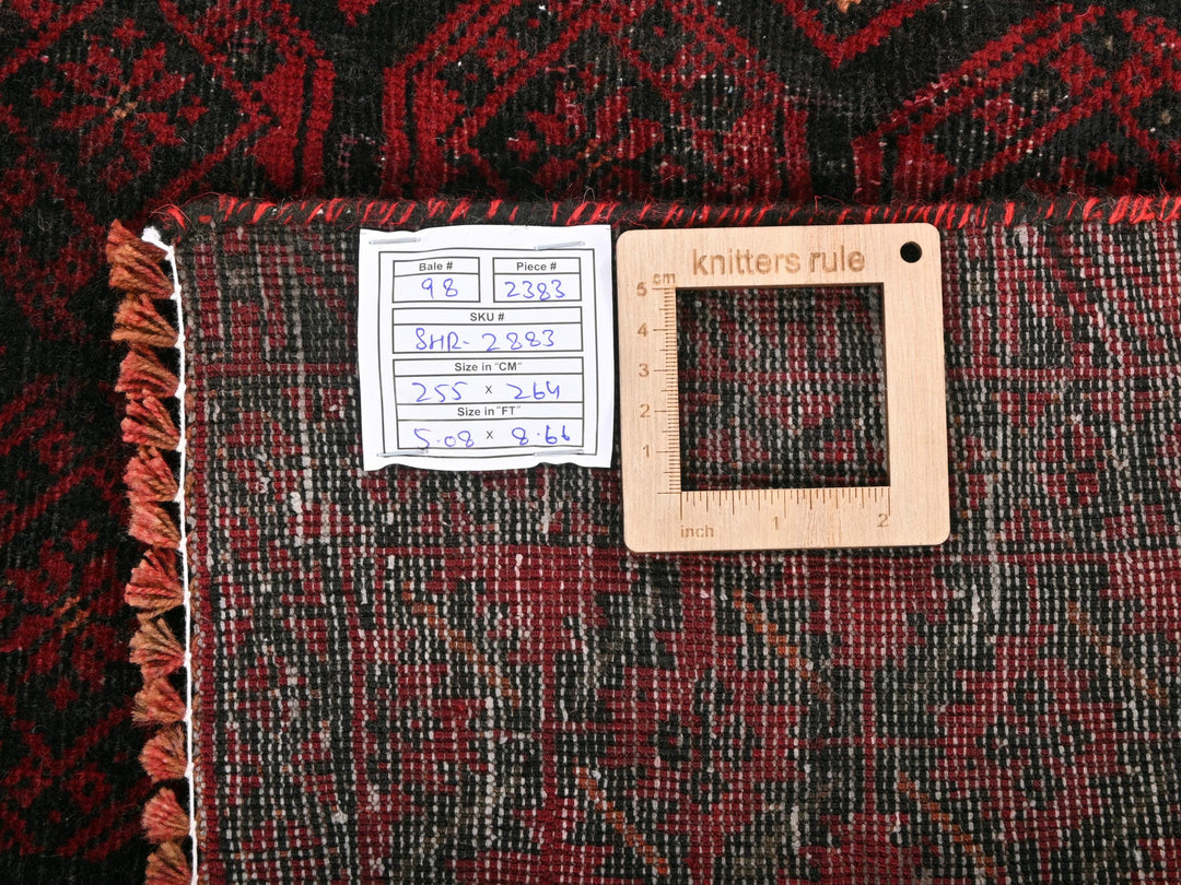 a piece of fabric with a ruler on top of it