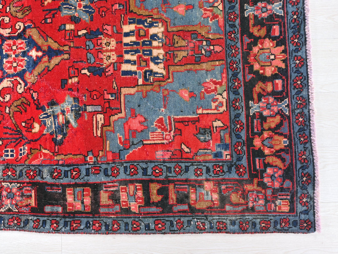 a red and blue rug with a horse on it