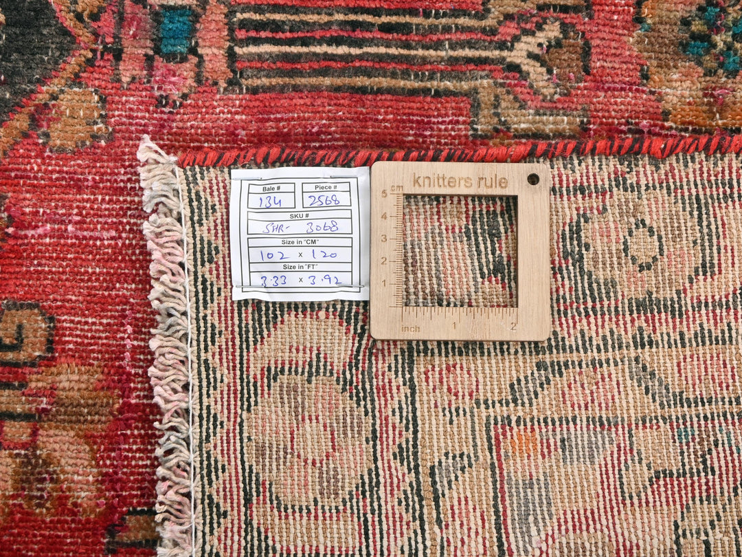 a close up of a rug with a tag on it