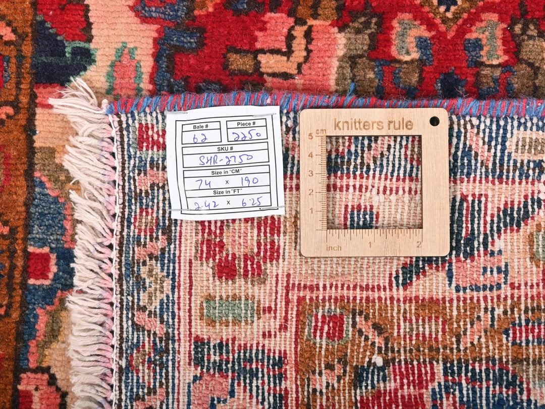 a piece of wood sitting on top of a rug