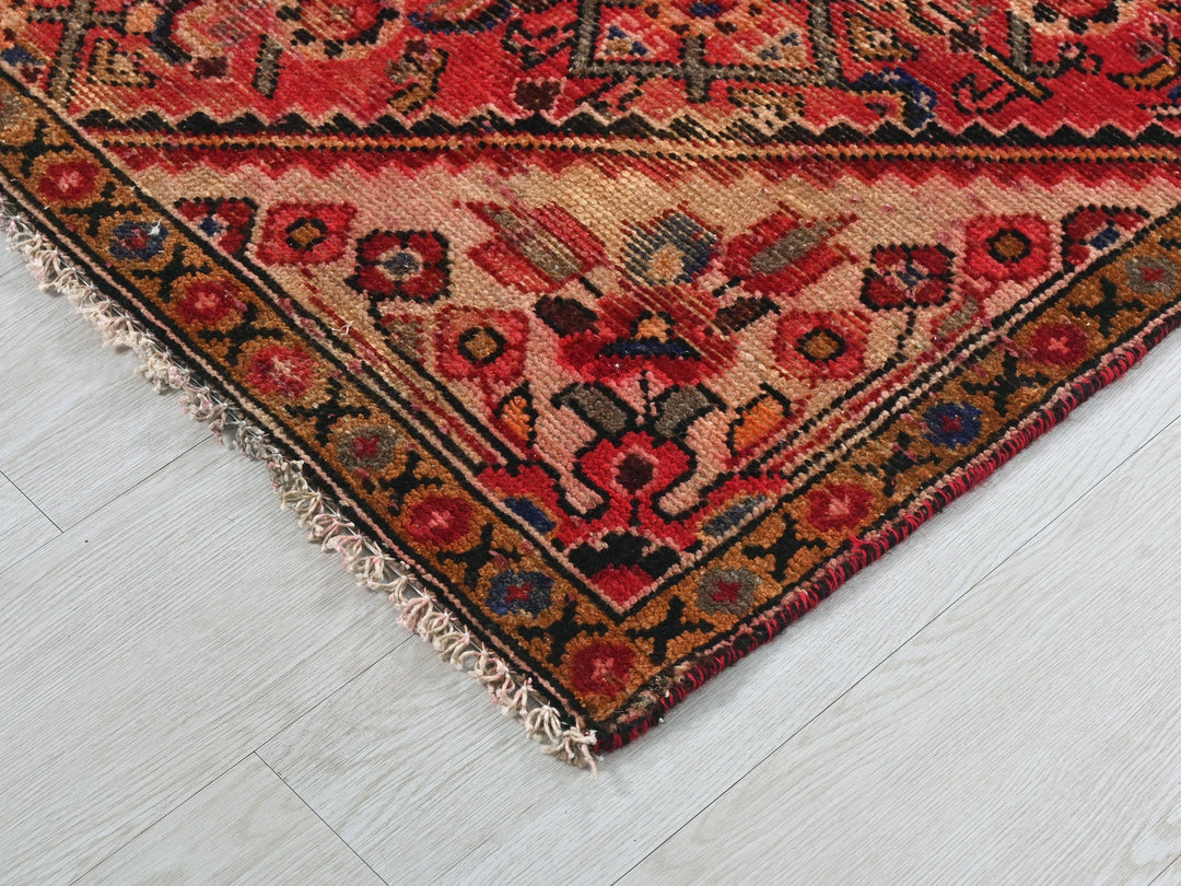 a large oriental rug on a white floor
