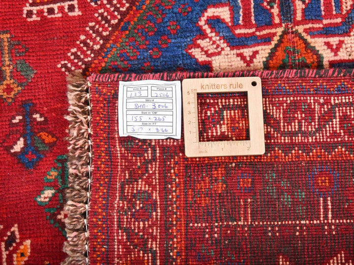 a close up of a rug with a tag on it