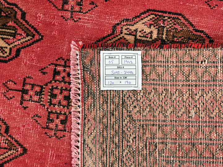 a pile of rugs with a price tag on them