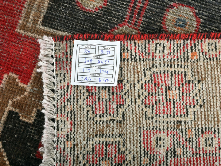 a close up of a rug with a tag on it