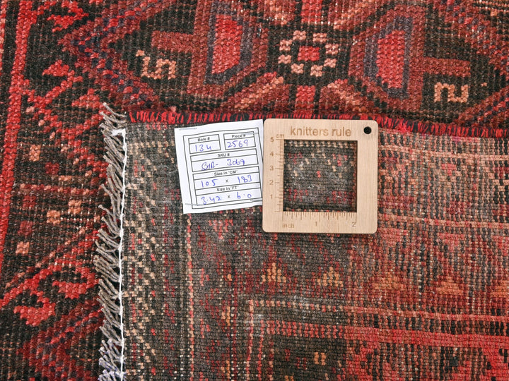 a piece of wood sitting on top of a rug