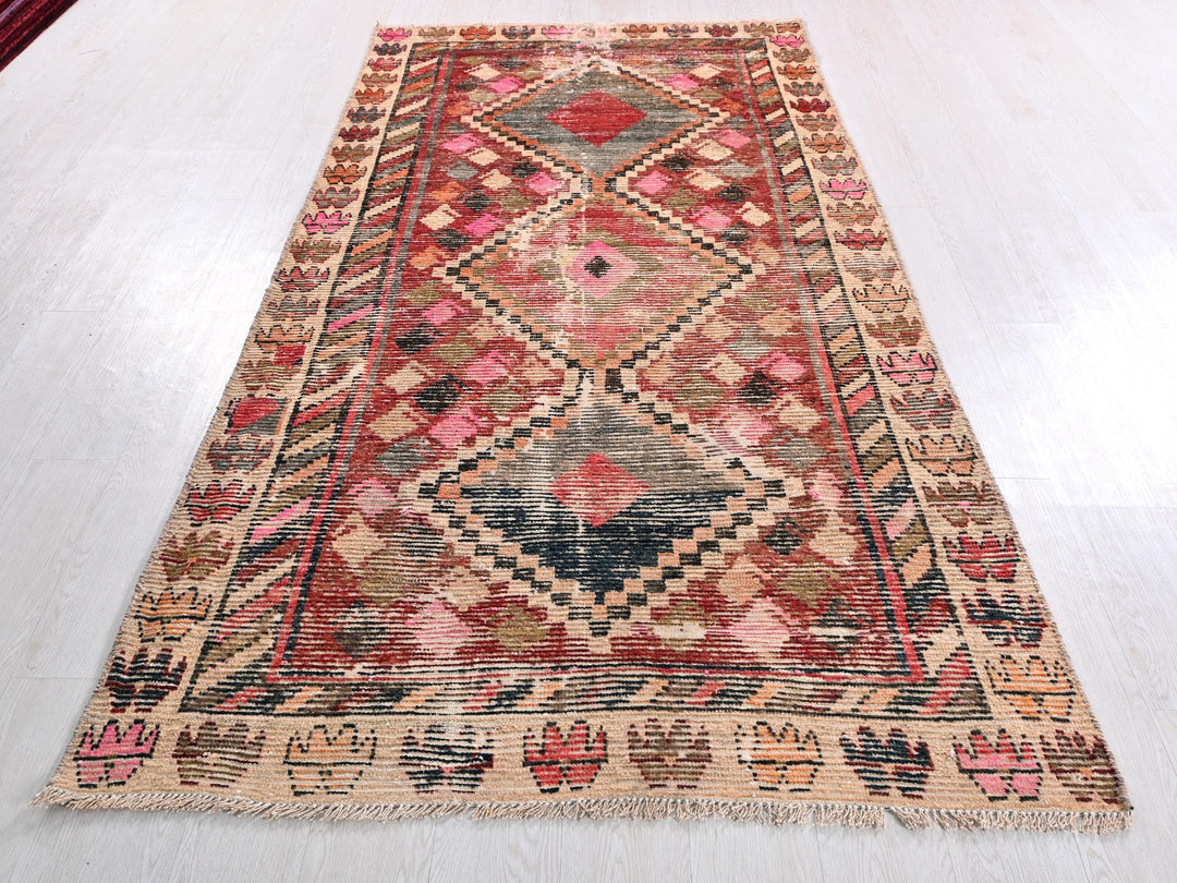 a large oriental rug on a white floor