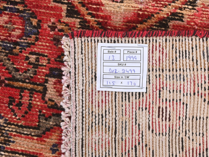 a close up of a rug with a tag on it