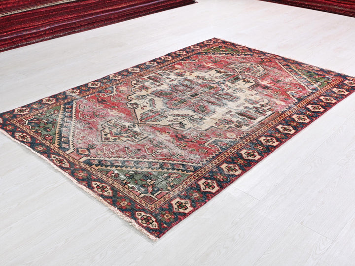 a rug is laying on the floor in a room