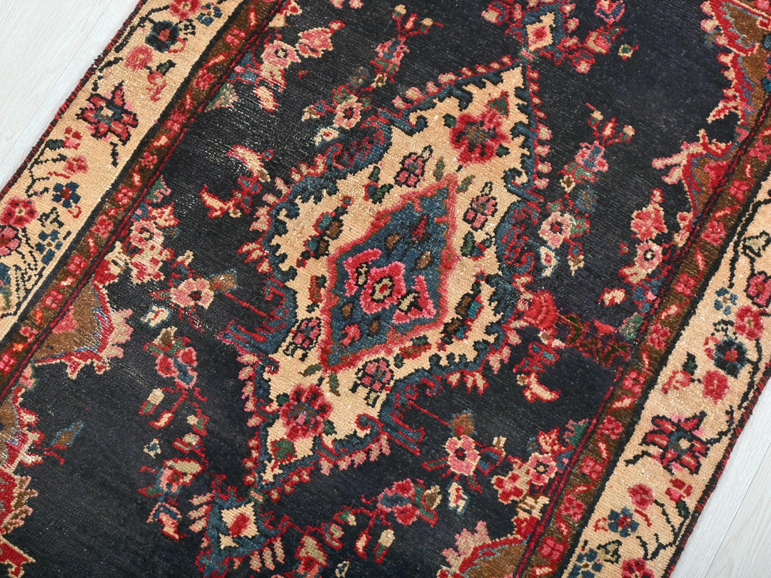 a large oriental rug on a wooden floor