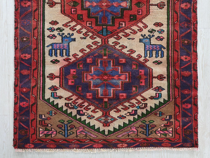 a colorful rug with animals on it