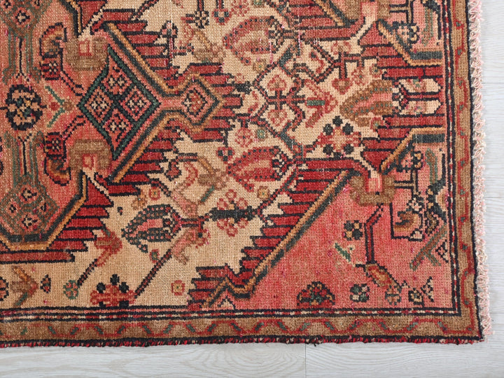 an old rug is laying on the floor