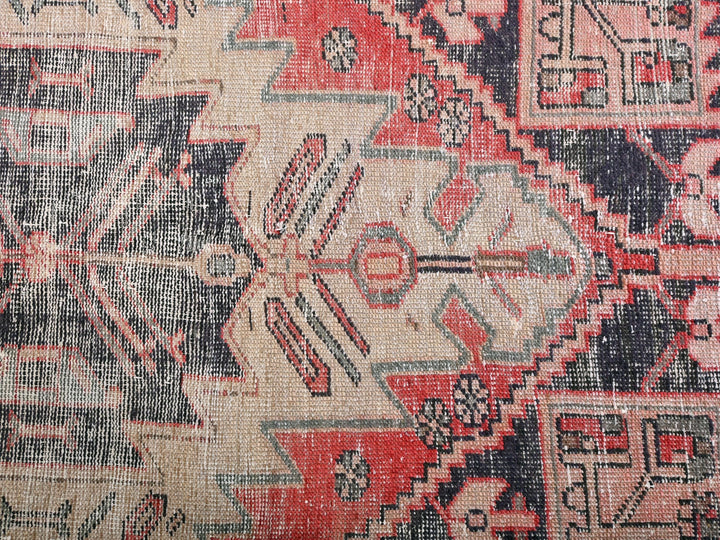 a close up of a rug with a pattern on it