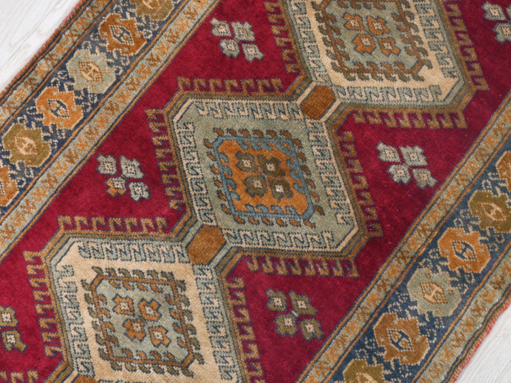 a close up of a rug on a wooden floor