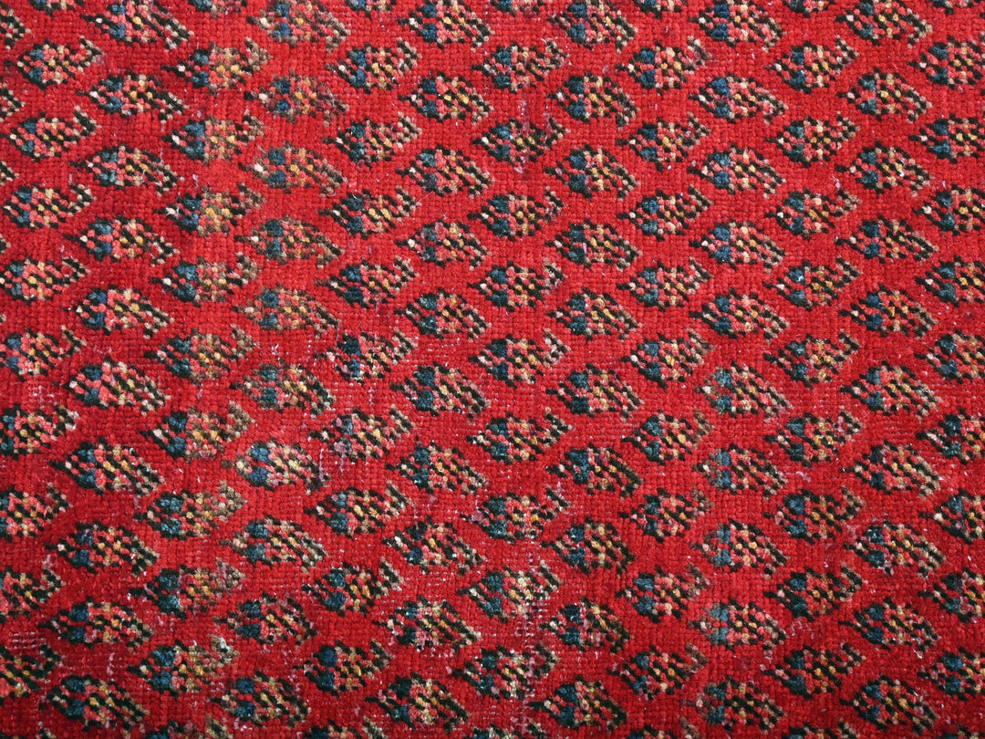 a close up of a red carpet with a pattern