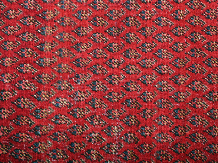 a close up of a red carpet with a pattern