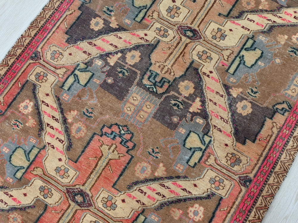 an old rug is laying on the floor