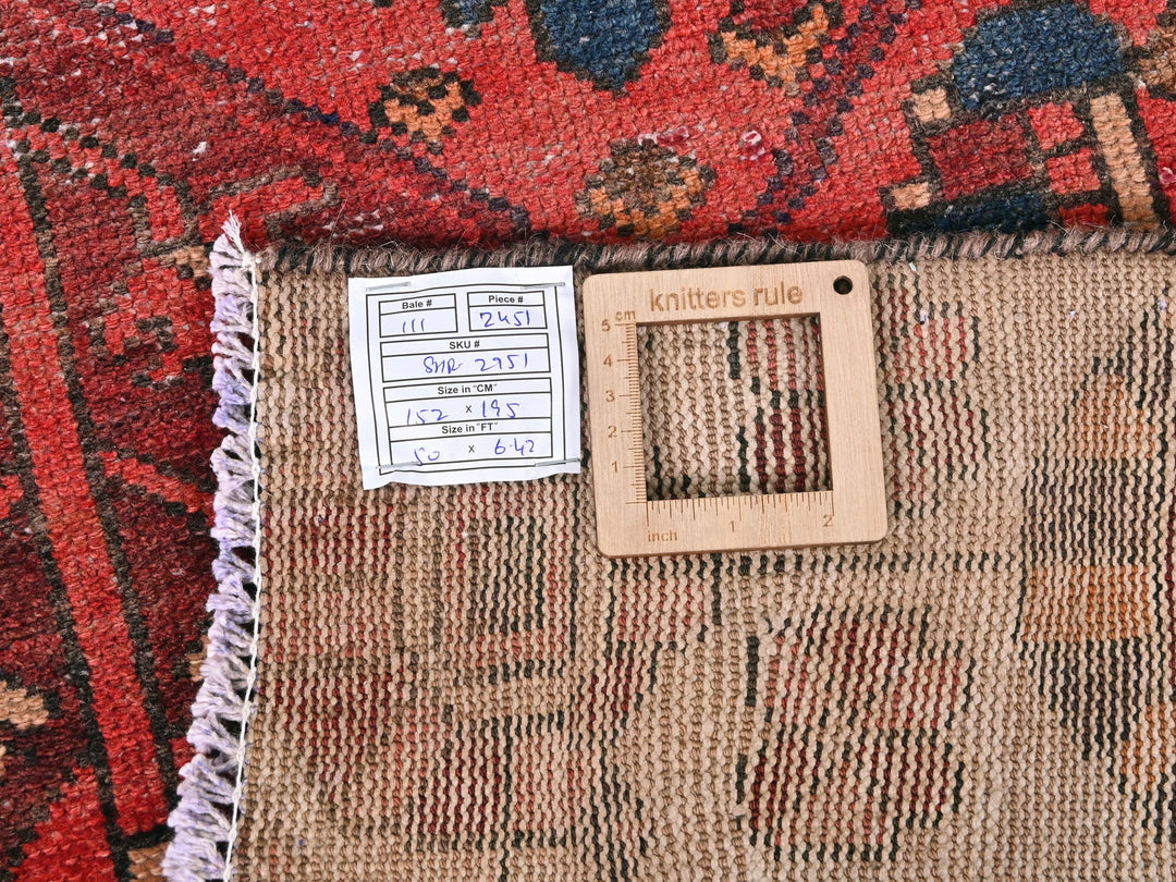 a piece of cloth with a ruler on top of it